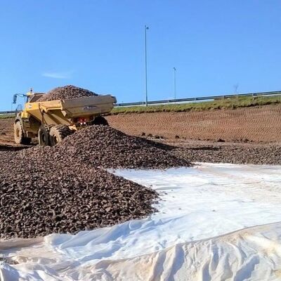 Hoge-taaiheid Hoge sterkte PET Polyester Materiaal Filament Geweven Geotextiel Stof voor Tunnel Bodem Fundering Versterking