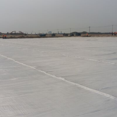 Hoge-taaiheid Hoge sterkte PET Polyester Materiaal Filament Geweven Geotextiel Stof voor Tunnel Bodem Fundering Versterking
