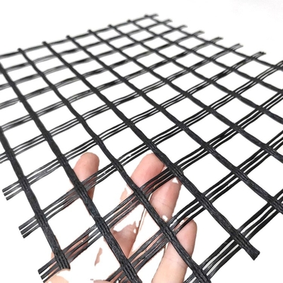 Tweeassig Road van het Garenbitume van Glasvezelgeogrid Reparatie Alkali Bestand Versterkend Netwerk